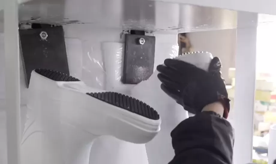 Applying anti-slip patches to the outsoles